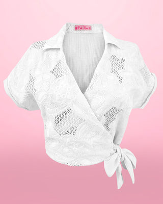 Blusa manga corta con flor bordada y moño al lado