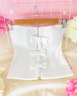 Blusa strapless con copas y 3 moños adelante