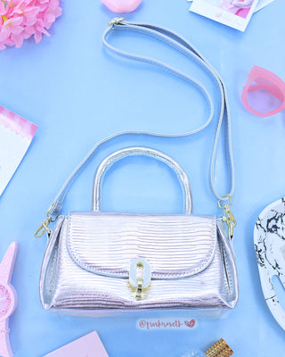 Bolso de mano plateado