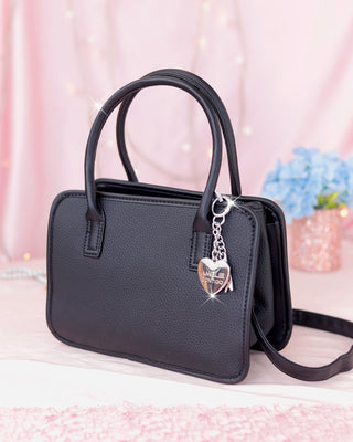 Bolso cuadrado tipo cartera con doble manija