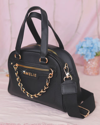 Bolso cuadrado con cadena colgante