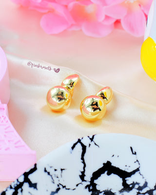 Aretes precolombinos dorados