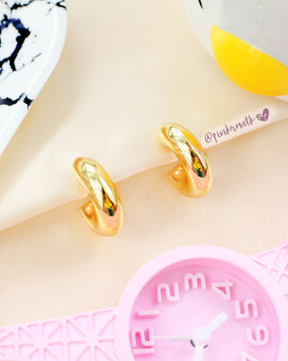 Arete dorado conchas grandes