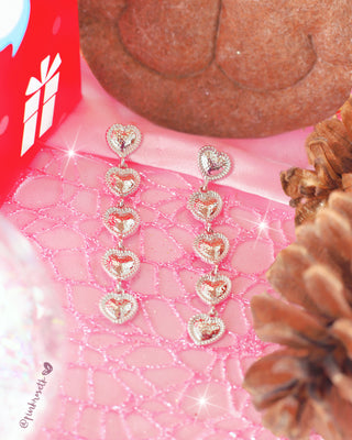 Aretes 5 corazones plateados