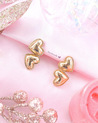 Aretes dorados doble corazón