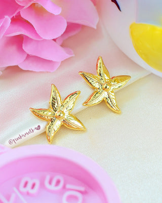 Aretes dorados estrellas de mar