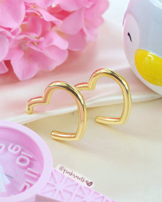 Aretes dorados de aro con forma de corazón grande