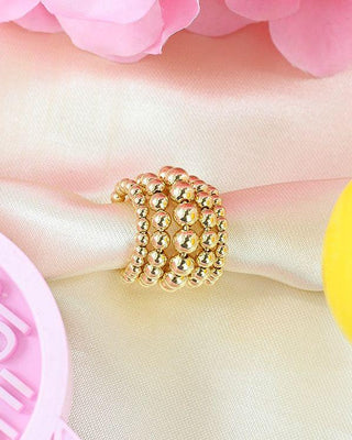 Ear cuff dorado argolla de cinco líneas mini balines