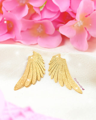 Aretes dorados maxi alas de ángel martilladas