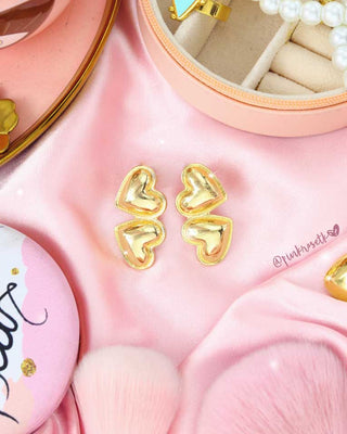 Aretes dorados doble corazon