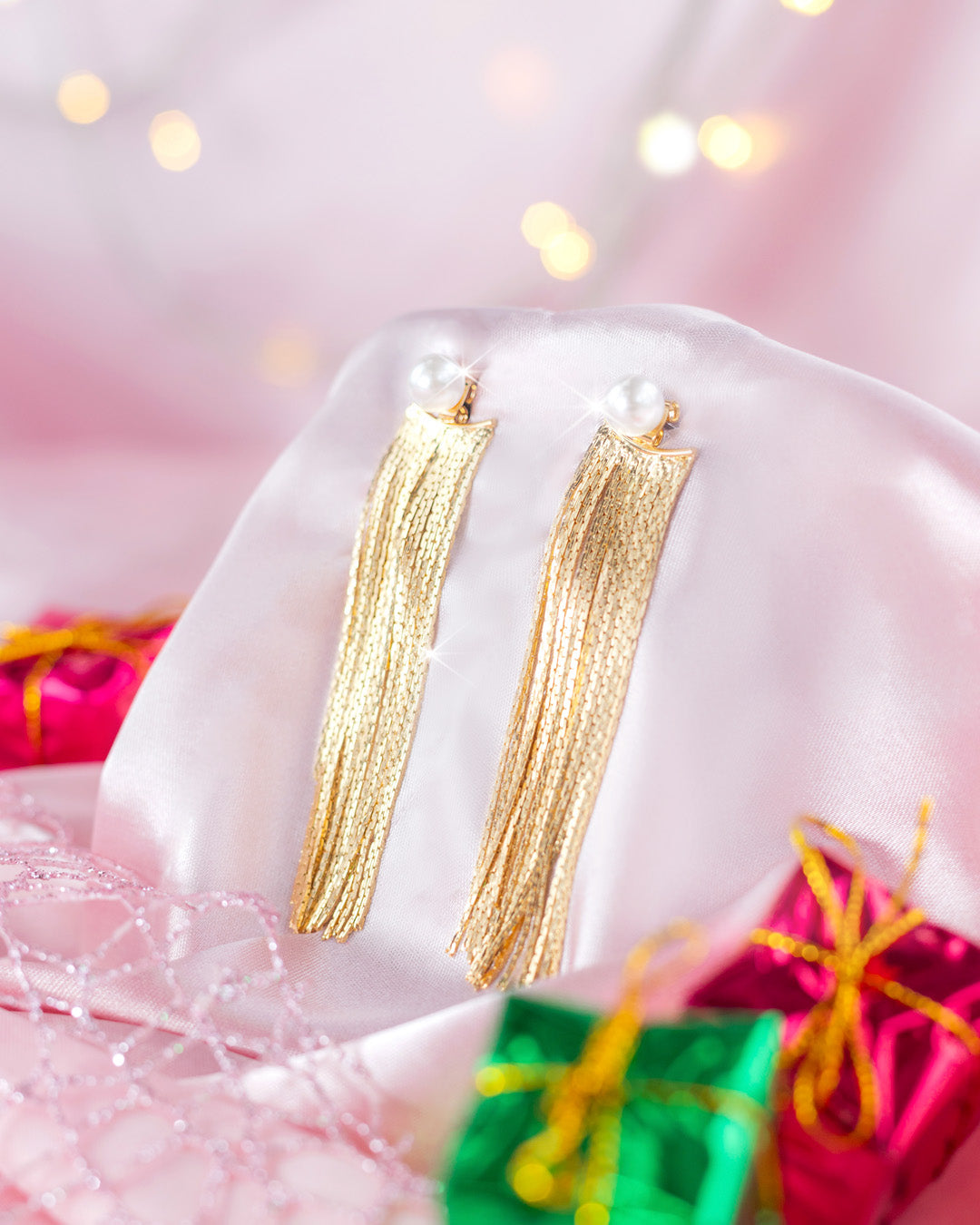 ARETES DORADOS TRENZAS COLGANTES