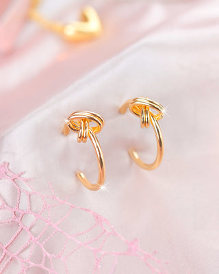 Arete tipo candonga con aplique espiral