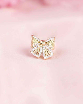 Arete simulador con moño