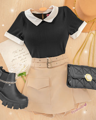 Bodysuit negro, manga corta con cuello y puños blancos