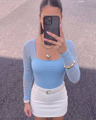 BODY AZUL EN MALLATEX MANGA LARGA RECOGIDA