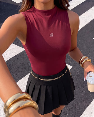 BODY VINO TIENTO MANGA SISA CON CUELLO Y LOGO PINK ROSE
