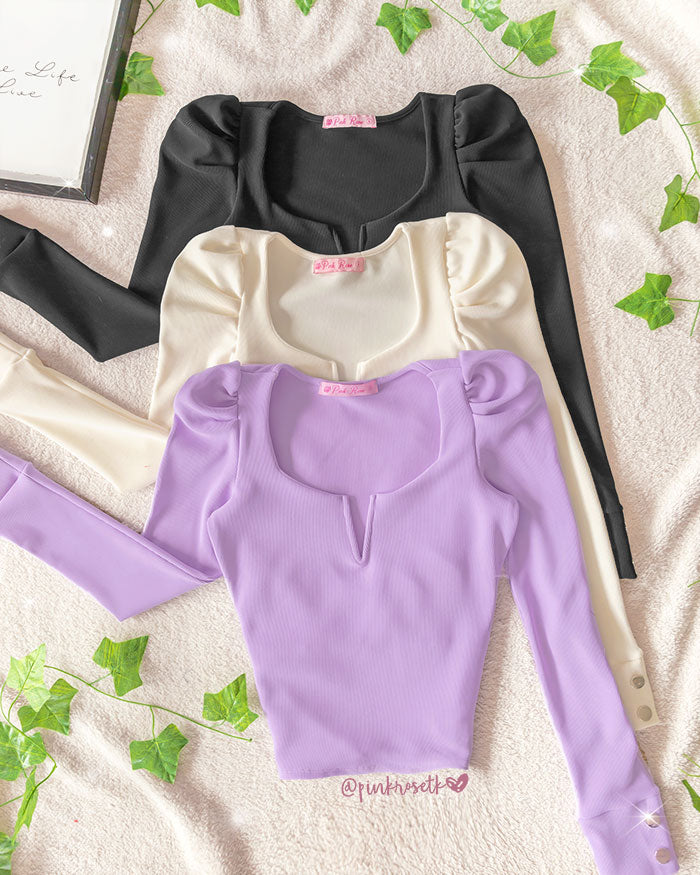 Blusa lila en rib, manga puff, cuello v con varilla