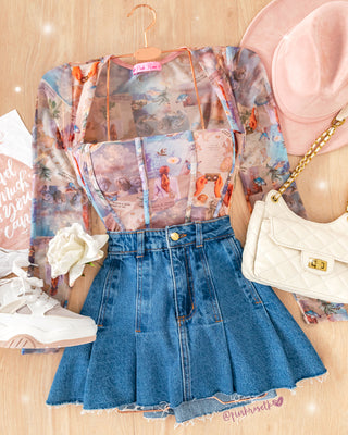 Blusa salmón malla tex manga larga estampado ángeles