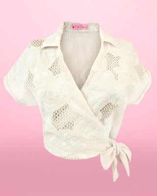 Blusa manga corta con flor bordada y moño