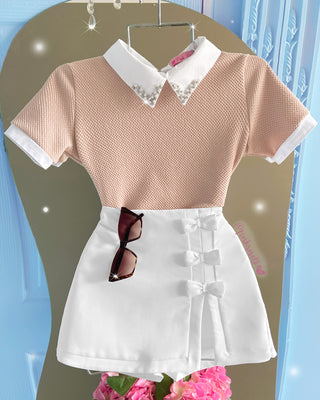 Blusa tejida manga corta con cuello y apliques