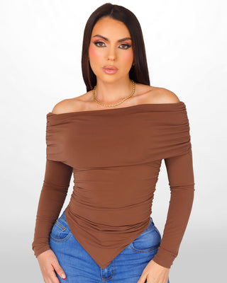 Blusa con escote drapeada y manga larga