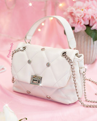 Bolso rombos taches redondos