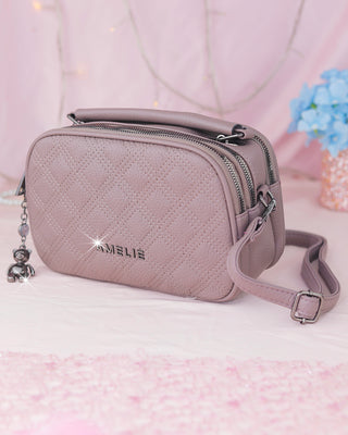Bolso tipo cartera con textura de rombos