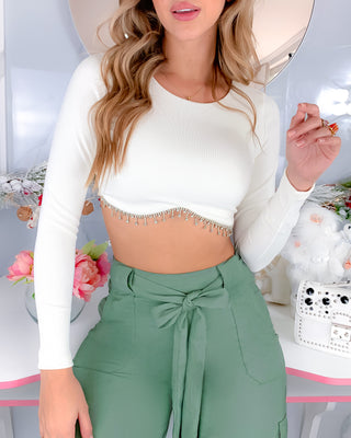 Blusa blanca en rib manga larga con aplique brillantes