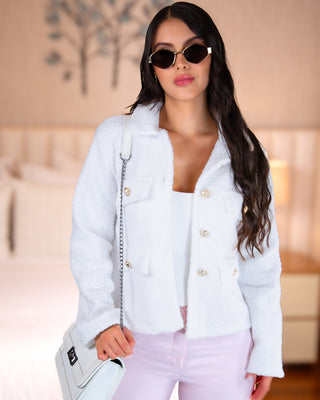 Chaqueta de punto con cuatro bolsillos y botones dorado