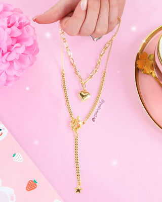 Collar dorado doble de eslabón corazón y cadena estrella