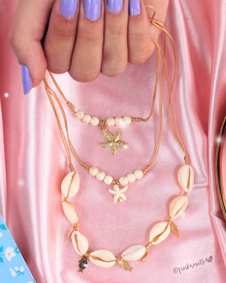 Set triple de collares conchas y ambiente marino