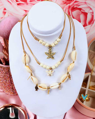 Set triple de collares conchas y ambiente marino
