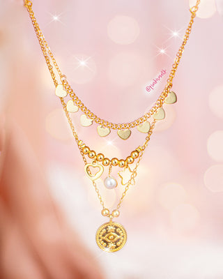 Collar dorado triple corazones perla y moneda