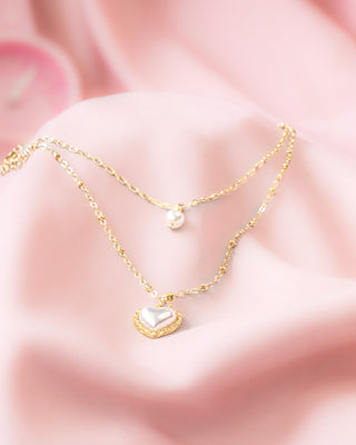 COLLAR DORADO DOBLE DIJE CON CORAZON EN PERLA