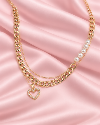 COLLAR DORADO DOBLE DE ESLABONES Y PERLAS CON CORAZON