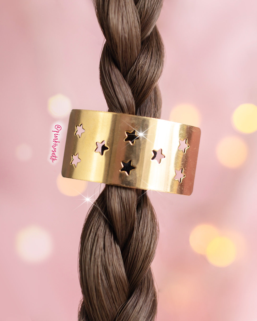 Pony cuff estrellas dorado