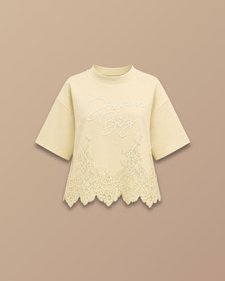 CAMISETA AMARILLA OVERZISE CON ENCAJE EN LA PARTE DE ABAJO