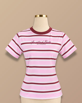 CAMISETA ROSA DE RAYAS CON FRASE “LA VIDA ES BELLA”