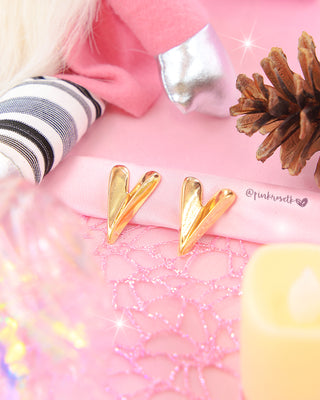 Aretes de corazones dorados