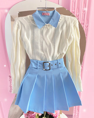 Falda azul bebe de tablas con cinturón