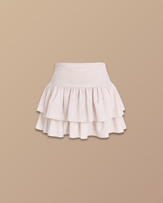 FALDA BEIGE DE BOLEROS CON LAZO AL LADO Y APLIQUE PINK