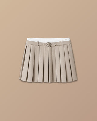 FALDA SHORT BEIGE DE TABLAS Y  HEBILLA CON PRETINA BLANCA