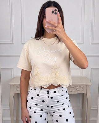 CAMISETA AMARILLA OVERZISE CON ENCAJE EN LA PARTE DE ABAJO