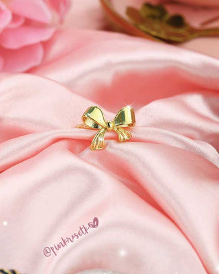 Anillo dorado abierto lazo  coquette