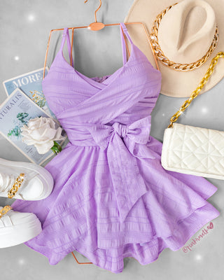Romper Lila con Tiras Cruzadas y Lazo