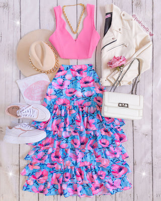 Falda maxi azul bebe estampado floral rosado de volantes