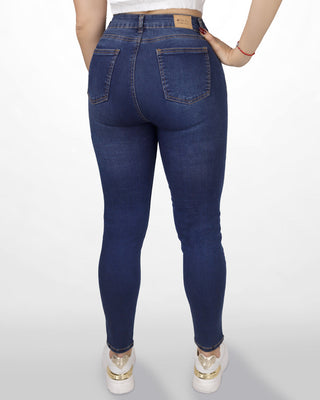 Blue jean super skinny tono oscuro desgastes