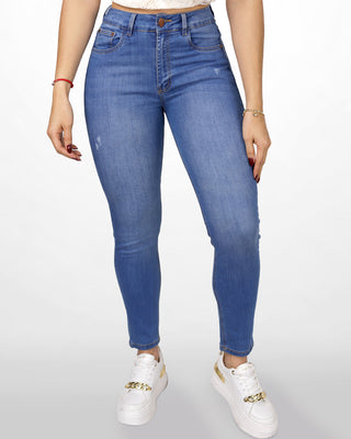 Jean super skinny tono claro con desgastes