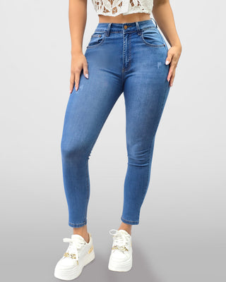 Jean super skinny tono claro con desgastes