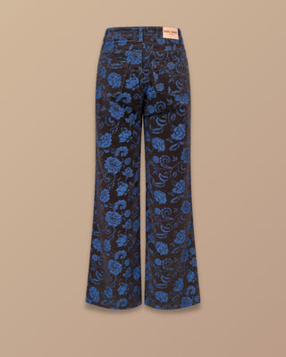 JEAN AZUL BOTA ANCHA CON FLORTES ESTAMPADAS